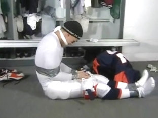 SUG Football player tape bound and cleave gagged