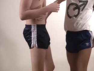 Boys dancing in shiny nike trackies and adidas shorts